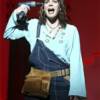 Laurie singing "Mamma Mia!"  Photo by Joan Marcus